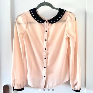 Blush coloured button-up sheer blouse with a studded collar